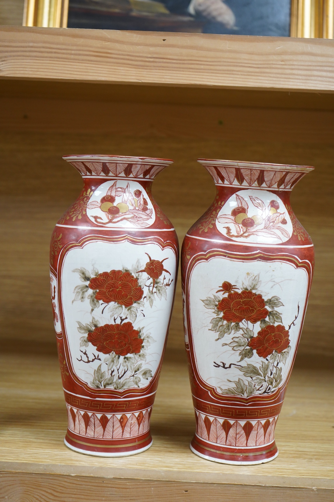 A pair of Japanese Kutani vases, signed, Meiji period (1868-1912), 25cm